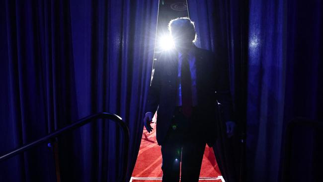 Donald Trump walks off stage at the Palm Beach Convention Center. Picture: AFP