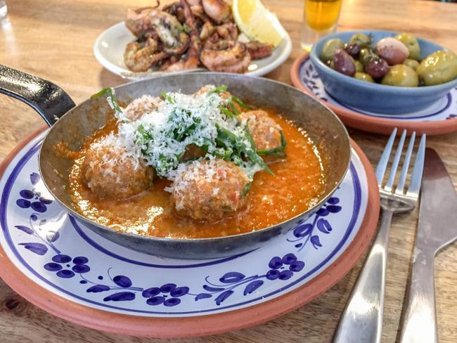 Encasa Restaurant’s abondigas (beef meatballs), grilled octopus and olives. Picture: Jenifer Jagielski