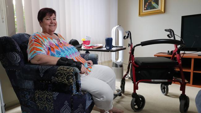 Currumbin Waters local and MS sufferer Thea Wren is just one of hundreds of Gold Coasters living in unsuitable accommodation because of a shortfall in specialist disability apartments. Picture Glenn Hampson