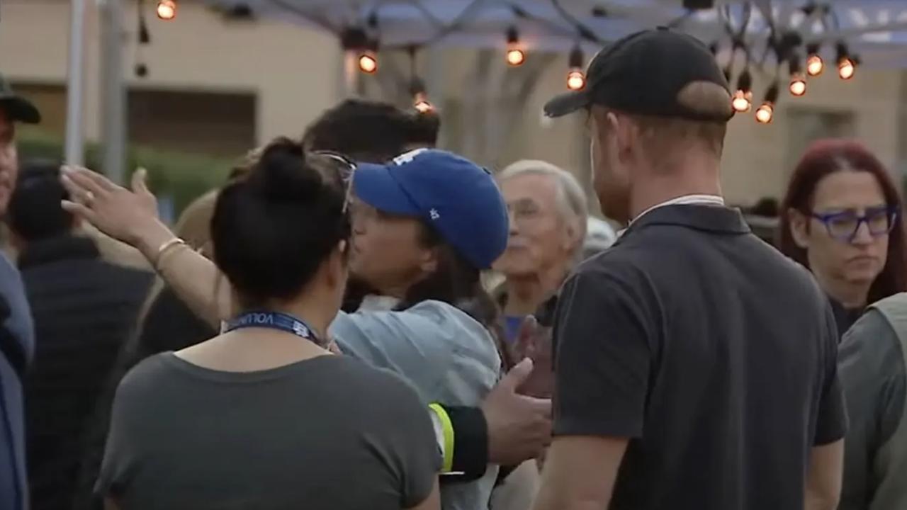 Prince Harry and Meghan Markle visited victims of the Eaton Fire in LA. Picture: FOX 11 Los Angeles