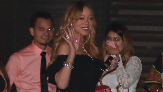 Mariah Carey was happy to flash her flesh while out at dinner in Malibu. Picture: Jacson/Splash News Australia