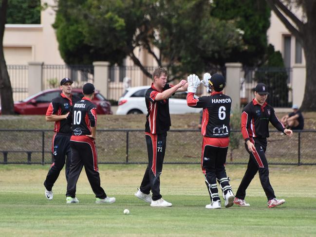 South Caulfield players celebrate a wicket on Saturday. Picture: Ron Weil