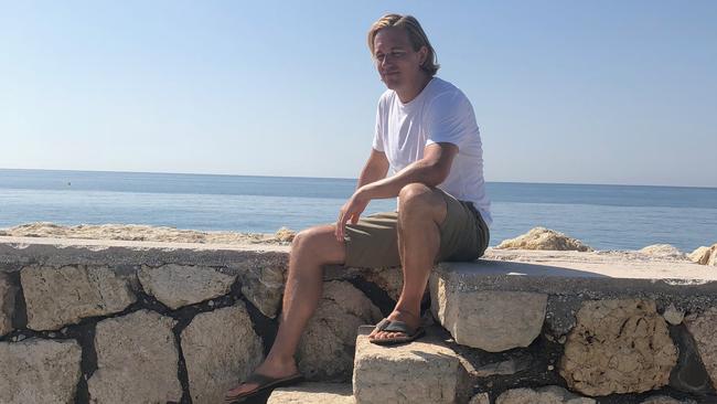 Mr Stuttle, himself an avid traveller, is pictured on a previous visit to Malaga.