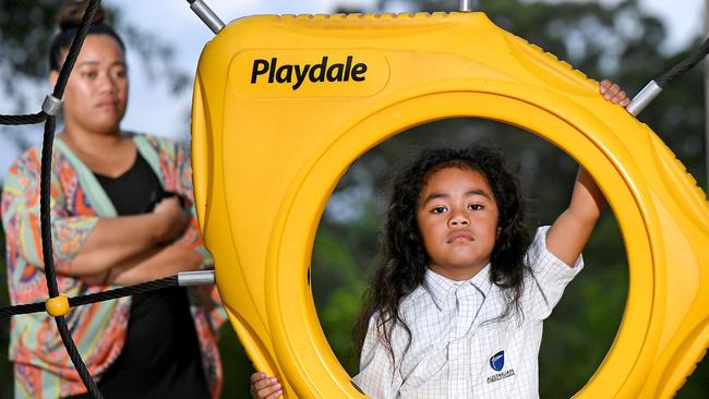 Wendy Taniela with her five-year-old son Cyrus Taniela. The mother says his Caboolture school, Australian Christian College Moreton, told them it had to be cut despite his hair cutting ceremony, which is part of his father’s Cook Islands and Niuean heritage, being still a year away Monday. Picture: AAP image, John Gass