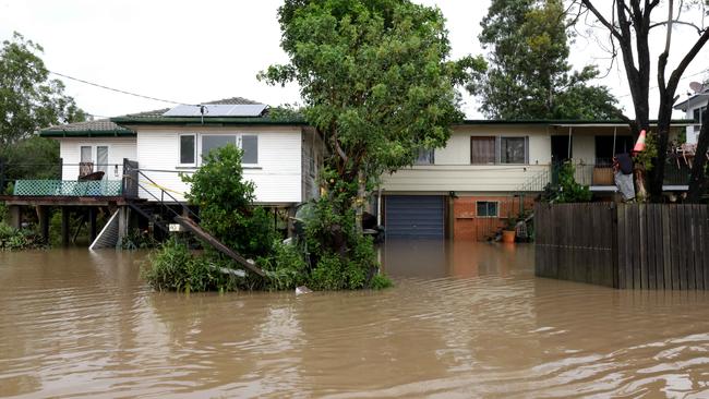 A home on Videroni St Bundamba on Monday as rivers and creeks rose around Ipswich. Picture: Steve Pohlner