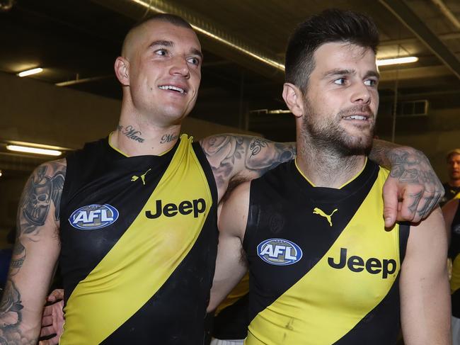 MELBOURNE, AUSTRALIA - APRIL 29: Dustin Martin and Trent Cotchin of the Tigers celebrate after the Tigers defeated the Magpies during the AFL round six match between the Collingwood Magpies and Richmond Tigers at Melbourne Cricket Ground on April 29, 2018 in Melbourne, Australia.  (Photo by Robert Cianflone/Getty Images)