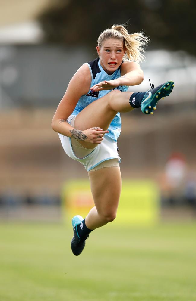 That distinctive Tayla Harris kicking style, in full flight. Picture: AFL Media/Getty Images