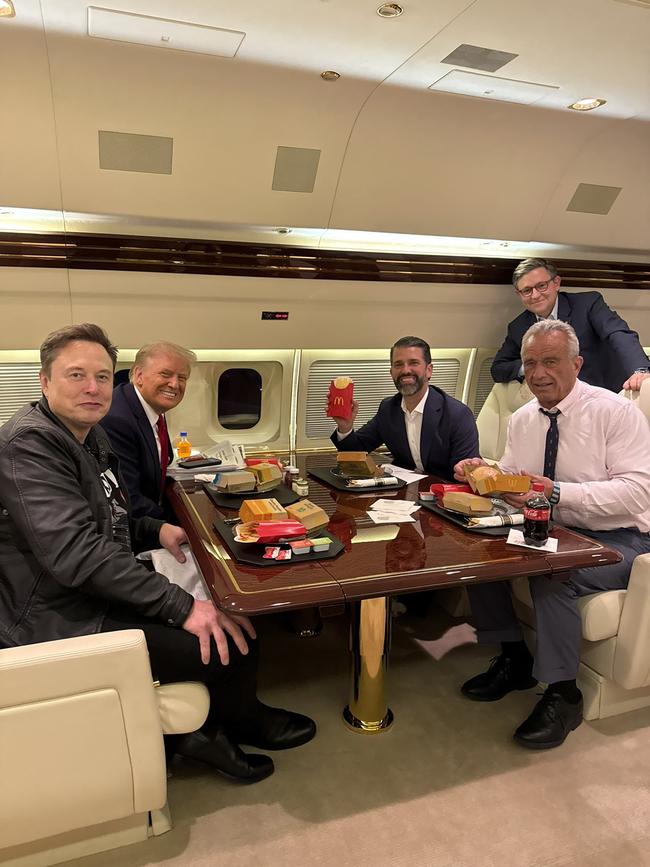 Elon Musk, Donald Trump, Donald Trump Jr and Robert F Kennedy Jr eat McDonald’s on the president-elect’s private plane.