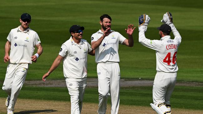 Michael Neser celebrates a wicket for Glamorgan.