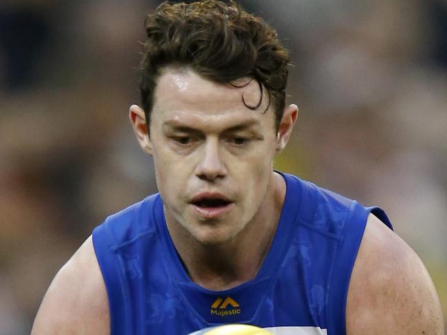 MELBOURNE, AUSTRALIA - AUGUST 25: Lachie Neale of the Lions gathers the ball during the round 23 AFL match between the Richmond Tigers and the Brisbane Lions at Melbourne Cricket Ground on August 25, 2019 in Melbourne, Australia. (Photo by Darrian Traynor/Getty Images)