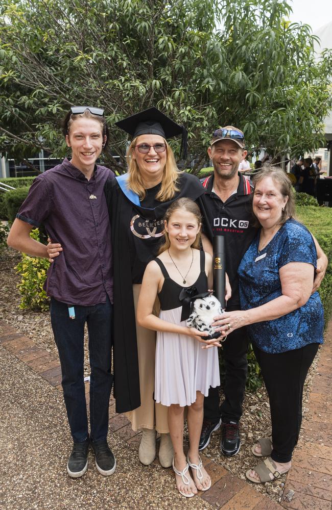 Bachelor of Nursing graduate Amanda Scott with family (from left) Jakob Richardson, Tia Scott, Damian Scott and Bronwyn Batchelor at a UniSQ graduation ceremony at Empire Theatres, Wednesday, February 14, 2024. Picture: Kevin Farmer