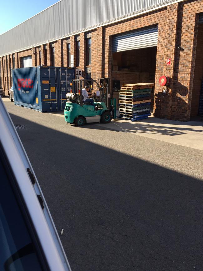 Wei Zhang unloads from a container delivered to Autong in Lansvale. Picture: PFM