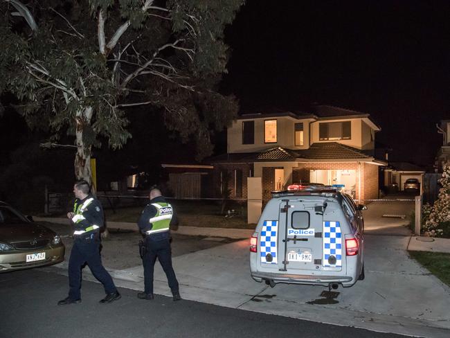 Police on the scene after a man was shot several times in the stomach outside his home in Stanley St, Glenroy. Picture: Jason Edwards