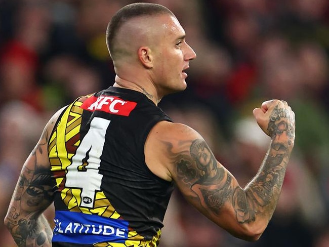 MELBOURNE, AUSTRALIA - MAY 25: Dustin Martin of the Tigers celebrates kicking a goal during the round 11 AFL match between Richmond Tigers and Essendon Bombers at Melbourne Cricket Ground, on May 25, 2024, in Melbourne, Australia. (Photo by Quinn Rooney/Getty Images)