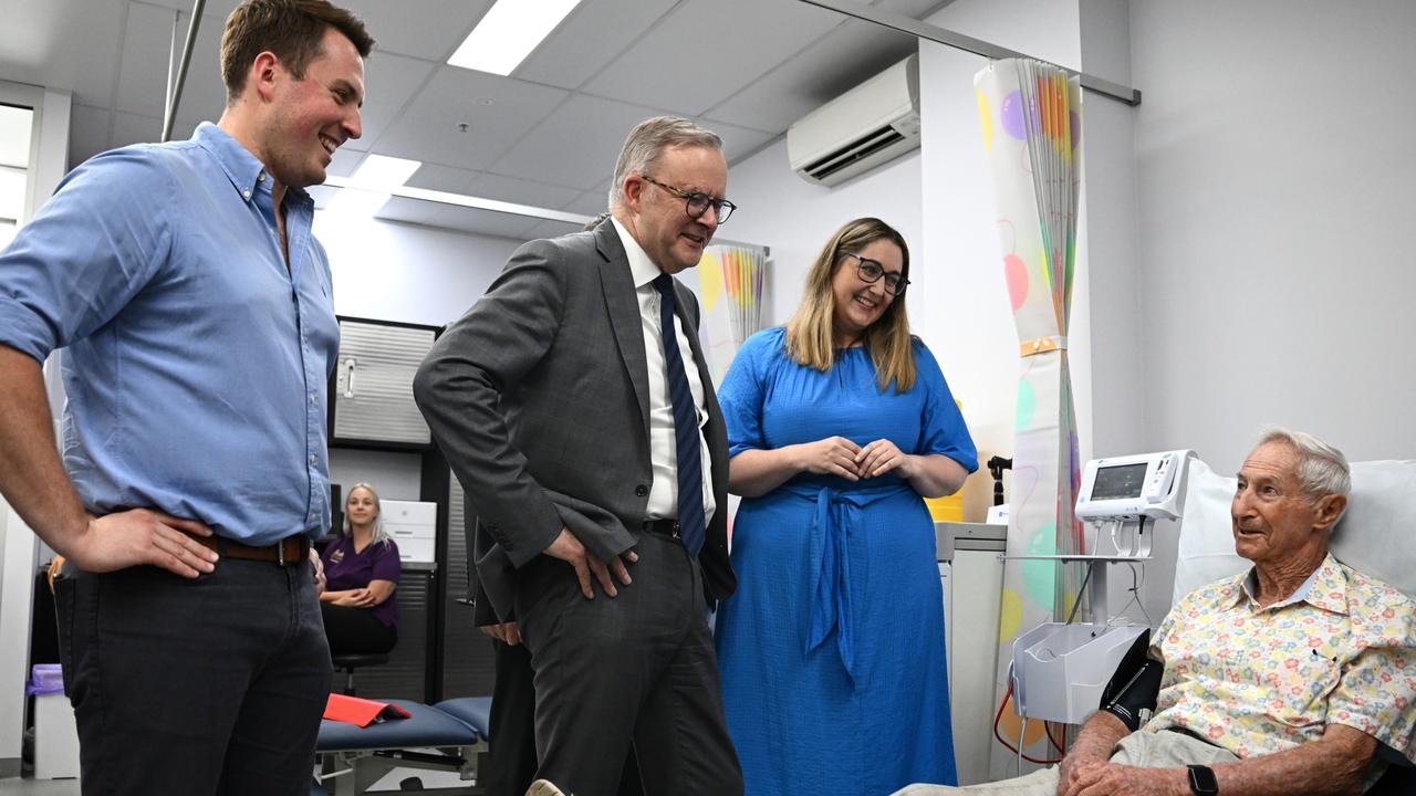 Prime Minister Anthony Albanese speaks with patient Tom Laidlaw, 93, along with Assistant Minister for Mental Health and Suicide Prevention Emma McBride and Dr Gordon Reid during a visit to the Lake Haven Urgent Care Clinic in NSW. Picture: AAP Image/Dan Himbrechts