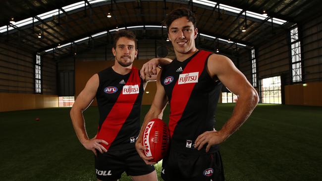 Michael Hibberd and Heath Hocking after re-signing with Essendon in 2014 before Hibberd later left the club in 2016. Picture: Michael Klein