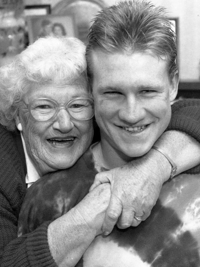 Mrs Nancy Buckley and her grandson Nathan Buckley while he was playing football for Port Adelaide Magpies in the SANFL in 1992.