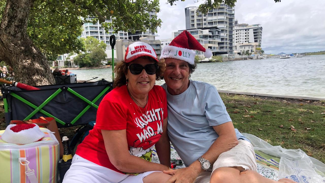 Janelle Gibbons and Gianni Vario enjoy Christmas celebrations at Cotton Tree Park. Picture: Laura Pettigrew.