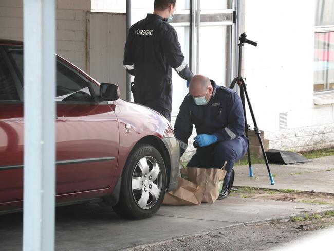 Police at the scene on Friday. Picture: David Crosling