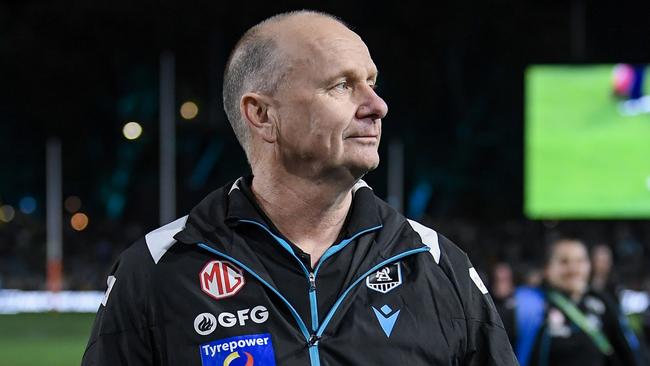 ADELAIDE, AUSTRALIA - SEPTEMBER 13: Ken Hinkley, Senior Coach of the Power  walks off the ground  after  the AFL Second Semi Final match between Port Adelaide Power and Hawthorn Hawks at Adelaide Oval, on September 13, 2024, in Adelaide, Australia. (Photo by Mark Brake/Getty Images)