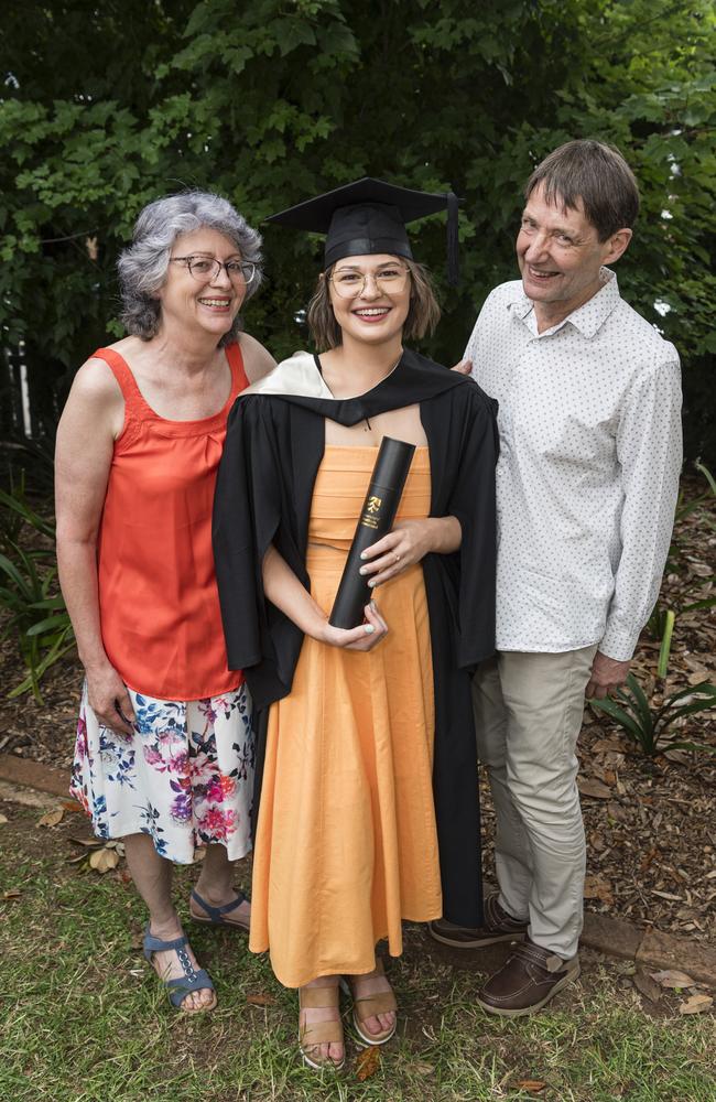 First-class honours Bachelor of Creative Arts graduate, University Medal recipient and Valedictorian Aimee Rowland with Anna and Peter Rowland at a UniSQ graduation ceremony at Empire Theatres, Tuesday, February 13, 2024. Picture: Kevin Farmer