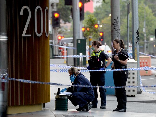 Police outside the building. Picture: Andrew Henshaw