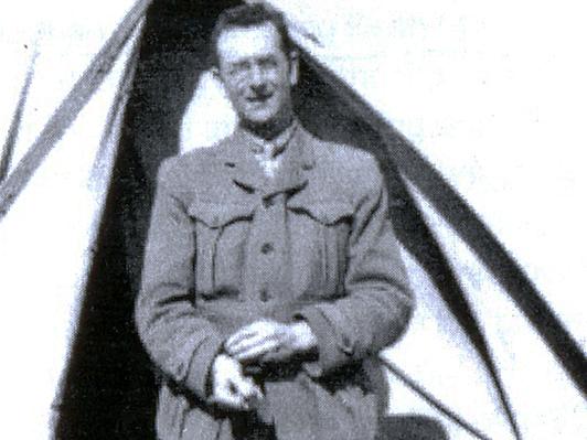 Charles Bean, honorary captain, outside his tent at Mena in Egypt.[PICTURE: Photographer unknown. Australian War Memorial]