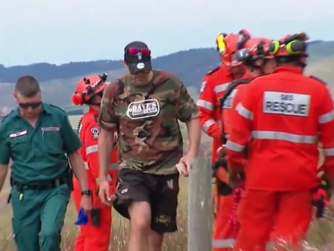 A hiker has been rescued after slipping down a dangerous cliff face, which then crumbled beneath him.