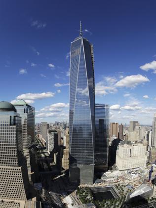 One World Trade Center is actually 124m shorter than it's official height, which is is boosted by a giant needle. (AP Photo/Mark Lennihan)