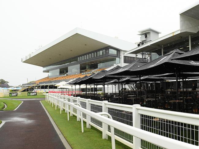 Rain falls during Family Raceday at Doomben Racecourse in Brisbane, Saturday, October 13, 2018. (AAP Image/Albert Perez) NO ARCHIVING, EDITORIAL USE ONLY