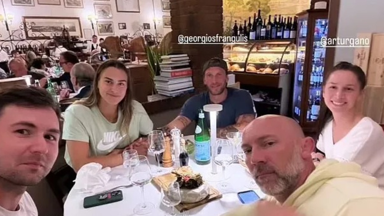 Aryna Sabalenka with her partner and team.