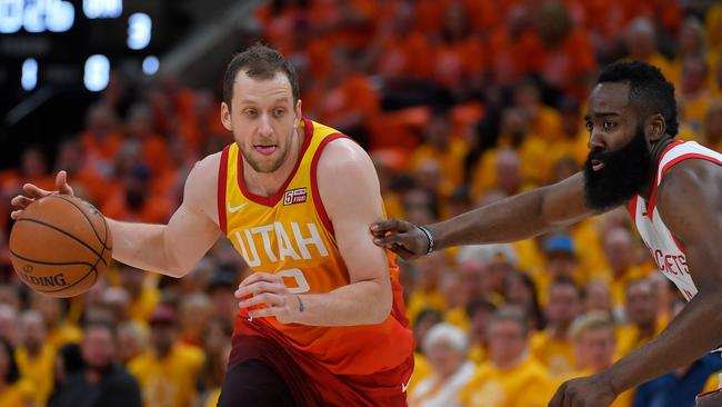 Joe Ingles drives past Houston’s James Harden last year. Picture: Gene Sweeney Jr./Getty Images/AFP