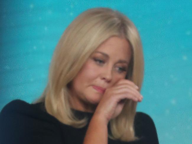 Sam Armytage on set during her last shift on the Sunrise show on 7 and a small group of fans outside. picture John Grainger