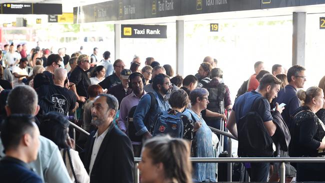 People queue for taxis at Melbourne airport. Picture: Josie Hayden