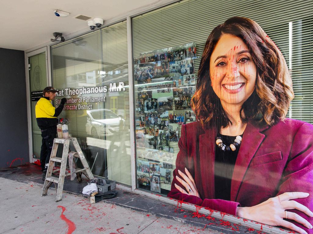 A cleaner works to remove red paint from the front office of Victorian Labor member Kat Theophanous on May 31. Picture: NewsWire / Diego Fedele