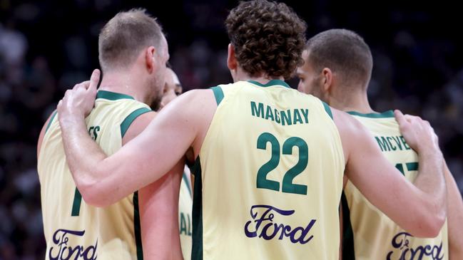 ABU DHABI, UNITED ARAB EMIRATES - JULY 15: Players of Australia huddle during the second half of an exhibition game between the United States and Australia ahead of the Paris Olympic Games at Etihad Arena on July 15, 2024 in Abu Dhabi, United Arab Emirates. (Photo by Christopher Pike/Getty Images)