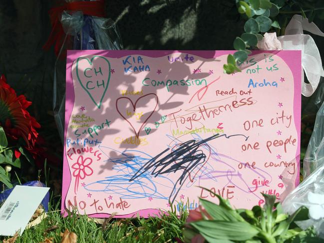 People began to place written tributes as well. Picture Gary Ramage