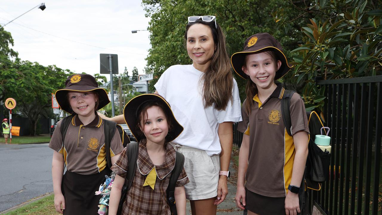 Rebekah Gook, pictured with her children Victoria, 8, Harriet, 5, and Charlotte, 11, relies on second-hand uniforms or hand-me-downs for Wilston State School. Picture: Liam Kidston