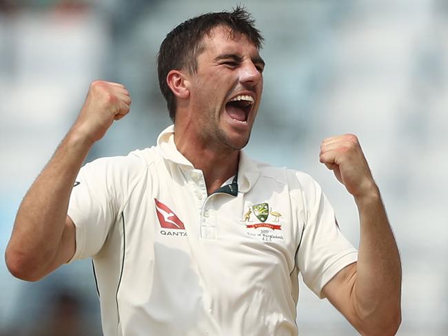 Australian fast bowler Pat Cummins celebrates after taking the wicket of Bangladesh’s Mushfiqur Rahim on Thursday.