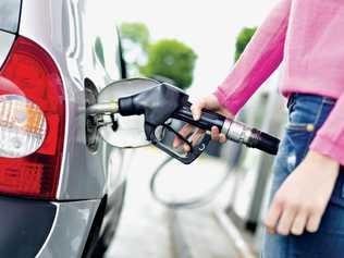 Lady pumping gasoline fuel in car at gas station. Picture: kasto80