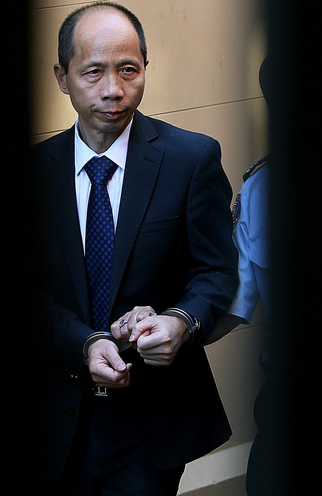 Robert Xie is led away from the Supreme Court to begin his five life sentences for the deaths of five members of the Lin family in their North Epping home in 2009.