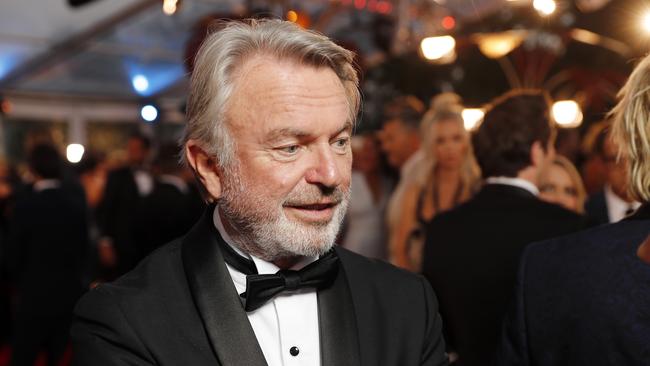 Star Sam Neill enjoyed the chance to relax on the Gold Coast. (AAP Image/Josh Woning)