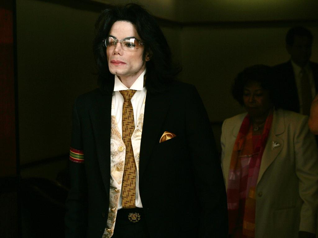 Michael Jackson leaves a Los Angeles courtroom in 2005. Picture: AFP