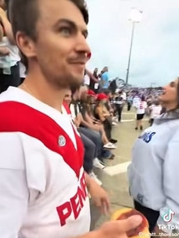 The Dragons fan holding the pie before throwing it. Picture: Facebook