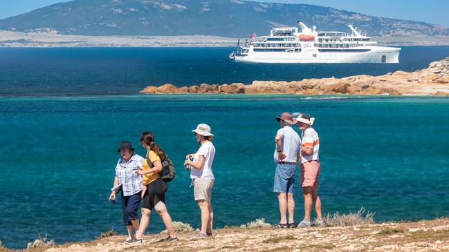 Passengers from the Coral Adventurer check out the scenery. Picture: Quentin Chester Photography