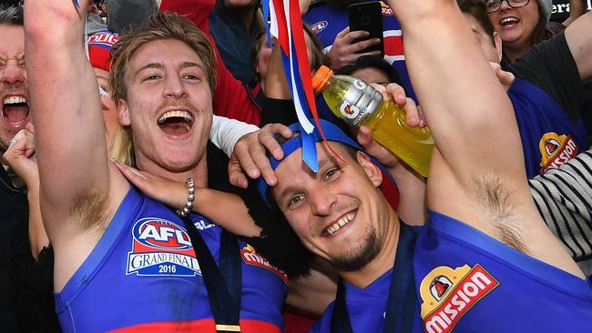 Shane Biggs and Clay Smith celebrate the 2016 grand final win. Picture: Quinn Rooney/Getty Images