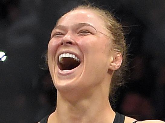 Ronda Rousey, celebrates after defeating Cat Zingano in a UFC 184 mixed martial arts bantamweight title bout, Saturday, Feb. 28, 2015, in Los Angeles. Rousey won after Zingano tapped out 14 seconds into the first round. (AP Photo/Mark J. Terrill)