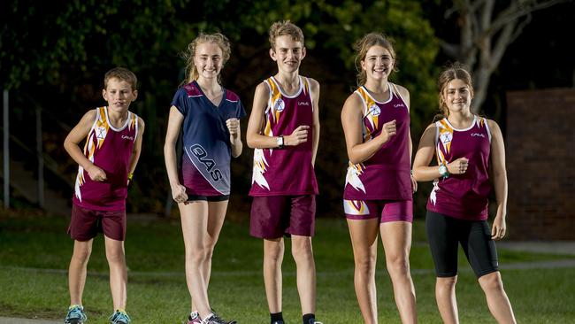 Caitlin Hannigcan, far rigfht, with team mates from the Queensland Race Walking Club. Picture Jerad Williams