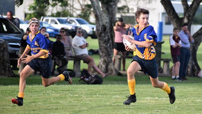 Connor Matsen, Gilroy, on his way to score with Jack Butcher in support. Photographs from the Will Murdoch Perpetual Shield. The annual U14 rugby league competition, in its second year, involved Gilroy Santa Maria College, Ingham State High School and St Teresa's Catholic College Abergowrie. Picture: Cameron Bates