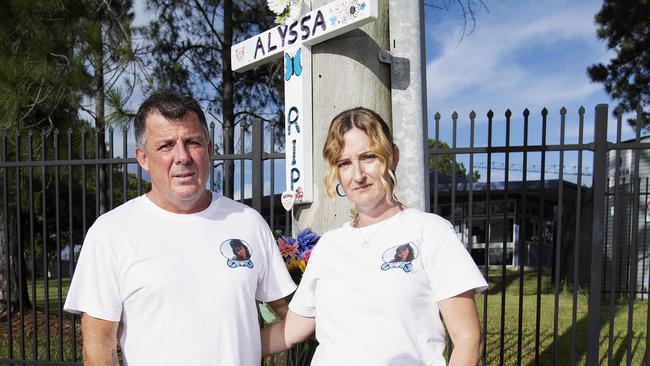 Troy and Kellie Postle at the site where the car their daughter, Alyssa, was a passenger in crashed. They intend lobbying for change to licensing laws for young drivers. Picture: Attila Csaszar.